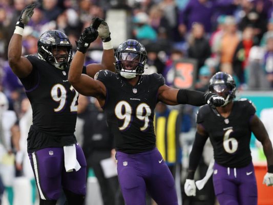 Baltimore Ravens Baseball Jacket: Stay warm and show off your Ravens pride with this stylish baseball-inspired jacket